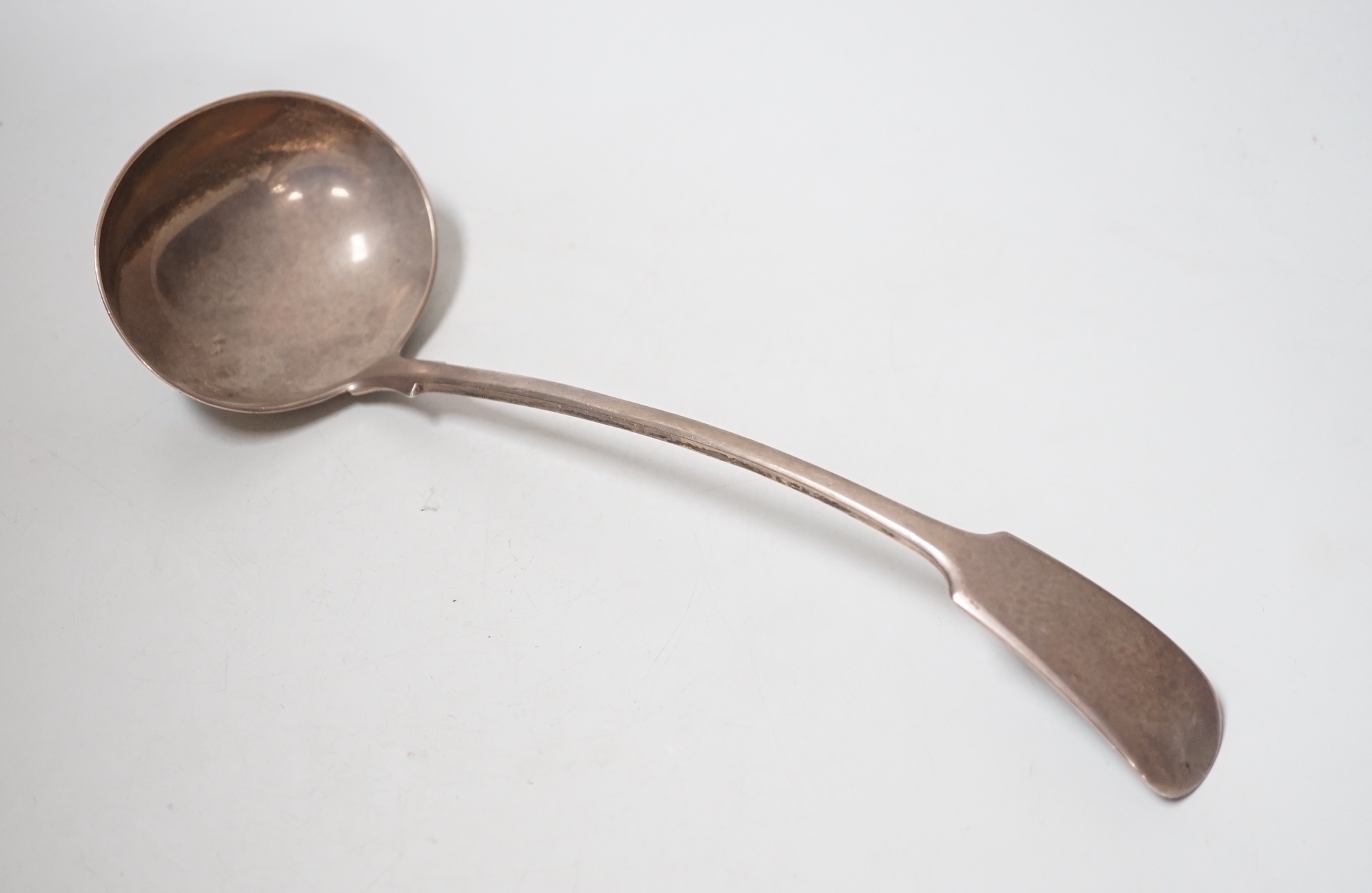 An Edwardian silver fiddle pattern soup ladle, Josiah Williams & Co, London, 1905, 31.2cm, 9.5oz.